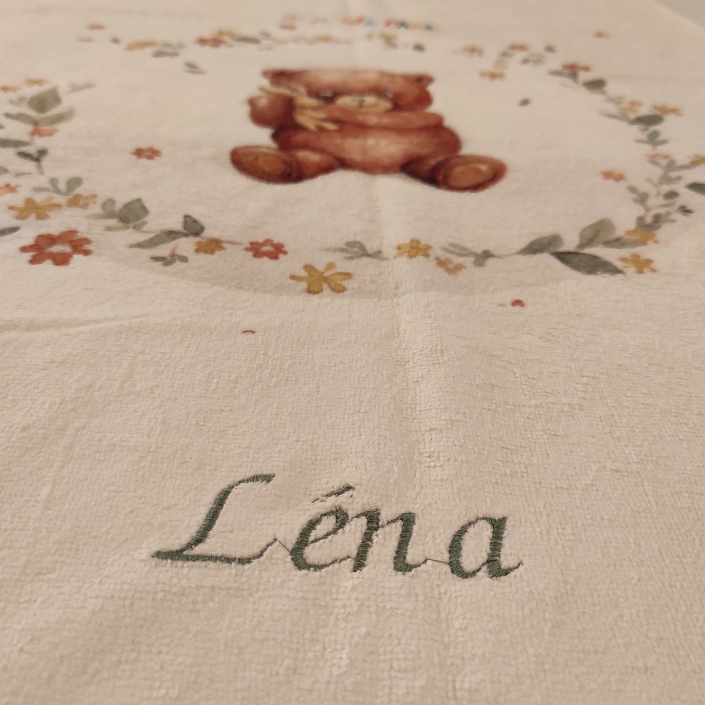 Broderie prénom en dessous du motif